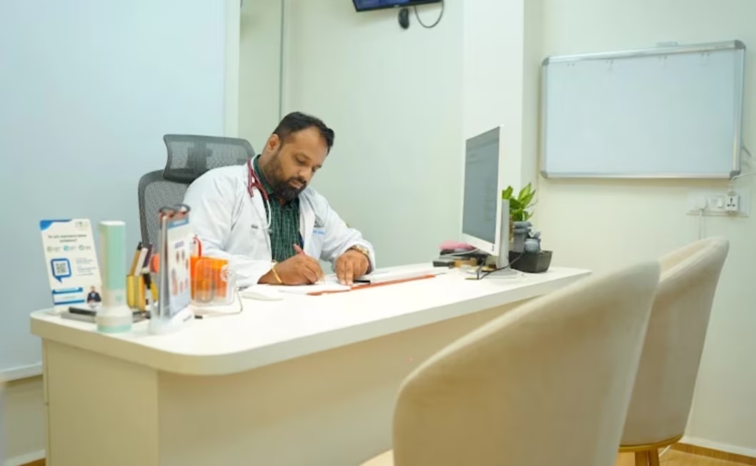 Dr. Suraj Kodak consulting in his clinic